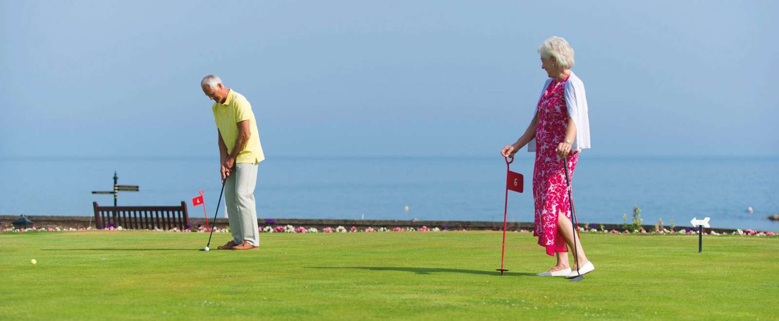 Belmont Hotel Couple Enjoying Putting Green on the Hotel Lawn